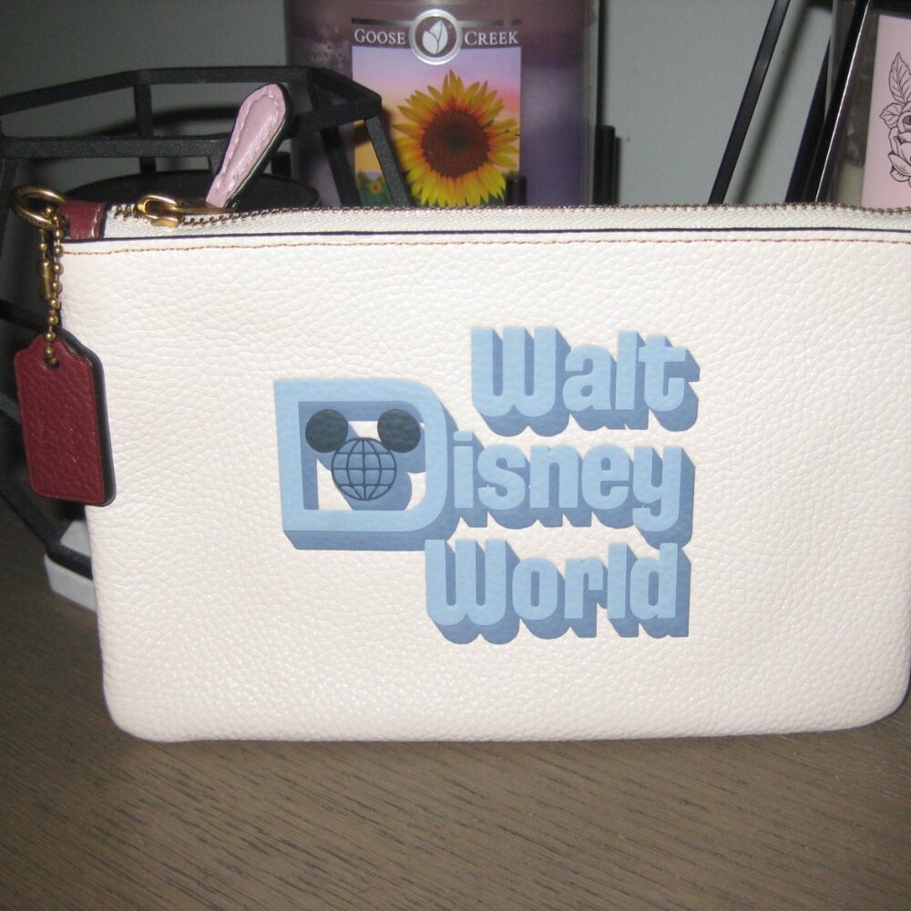 NWT Coach Walt Disney World small wristlet in Chalk - New but missing loop strap